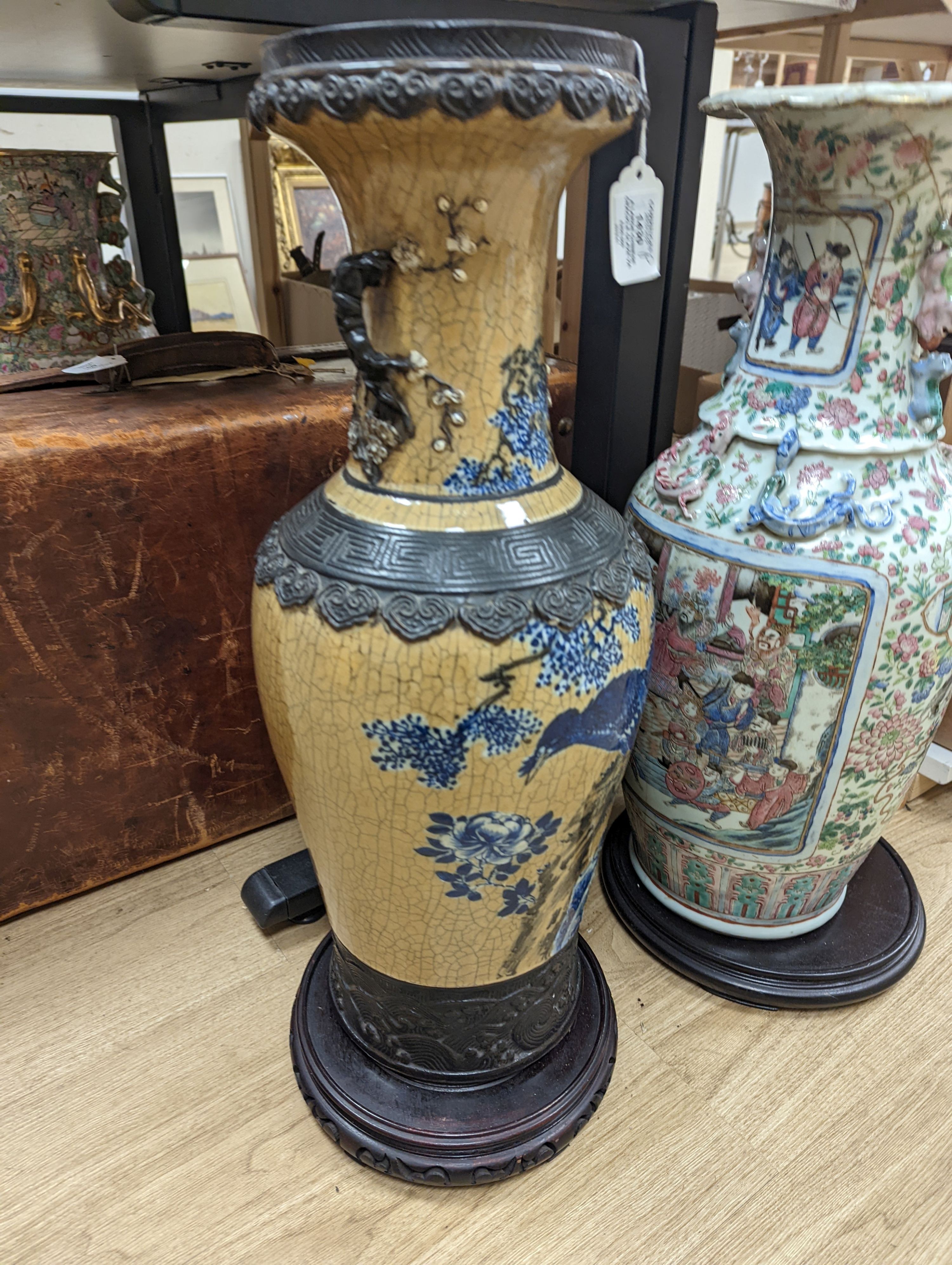 A large Chinese crackle glaze vase, late 19th/early 20th century and a large Chinese famille rose vase, late 19th century, tallest 60 cm.